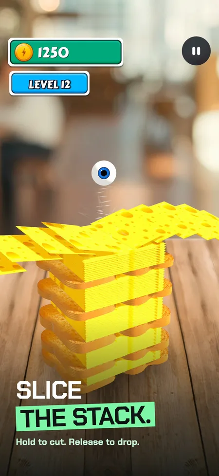 Sliceball screenshot with caption: slice the stack, an eyeball on cheese in the café